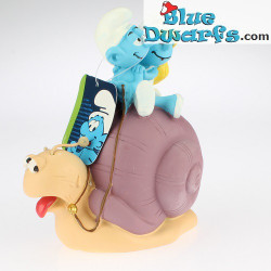 Paben: Smurfs on snail (moneybox)
