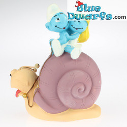 Paben: Smurfs on snail (moneybox)