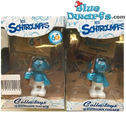 PLA0149+PLA150: Puffo dimostrante  "60 years smurfs +Smurf Experience" (2018)