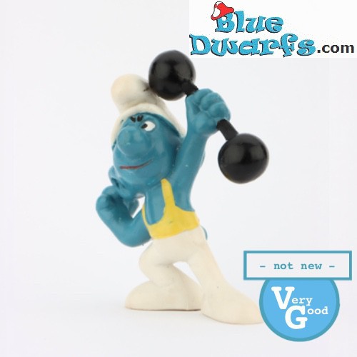 20020: Hefty Smurf with Dumbbell - Yellow outfit VG - Schleich - 5,5cm