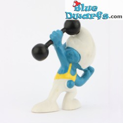 20020: Hefty Smurf with Dumbbell - Yellow outfit VG - Schleich - 5,5cm