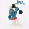 20020: Hefty Smurf with Dumbbell - Red outfit VG - Schleich - 5,5cm