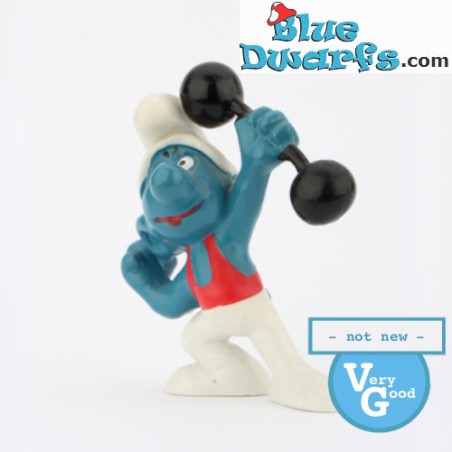 20020: Hefty Smurf with Dumbbell - Red outfit VG - Schleich - 5,5cm