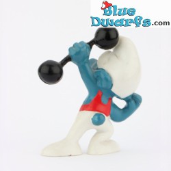 20020: Hefty Smurf with Dumbbell - Red outfit VG - Schleich - 5,5cm
