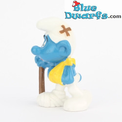 20097: Blessé Schtroumpf - brun foncé/ épais bâton - Schleich - 5,5cm