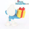 20086: Puffo giocerellone con regalo - regalo giallo - Versione CNT - 5,5 cm