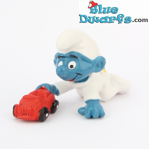 20215: Baby smurf with toy car - Schleich - 4cm