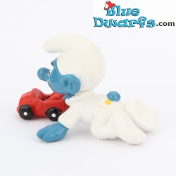 20215: Baby smurf with toy car - Schleich - 4cm