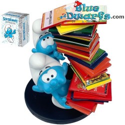 Smurfs with pile of books -...