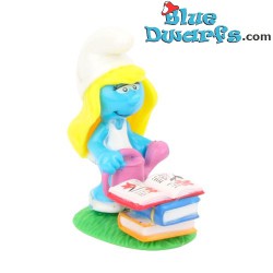 Smurfette with books and...