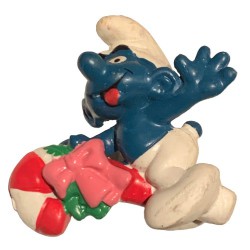 51907  - FAKE - : Christmas Smurf Riding Candy cane