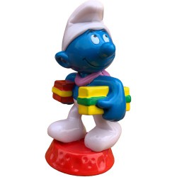 Smurf with christmas gifts - Candytopper -   (BIP Holland, +/- 8cm)