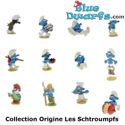 pixi06431: Smurf with pile of books (2012)