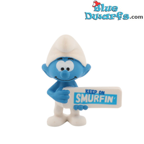 20843: Pitufo con cartel: "Keep on Smurfin" (2023) - Schleich - 5,5cm